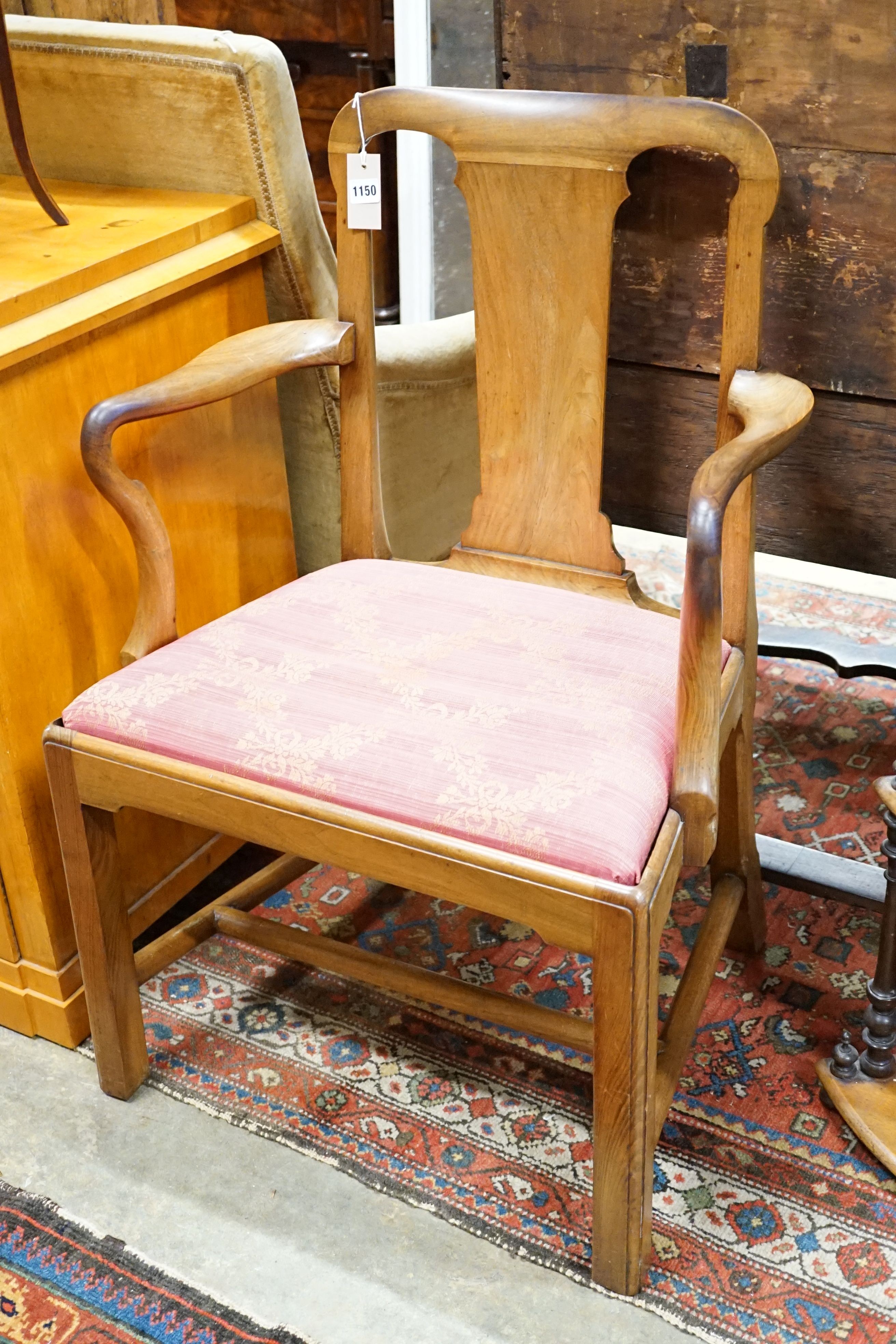 A George III mahogany elbow chair, width 62cm, height 92cm